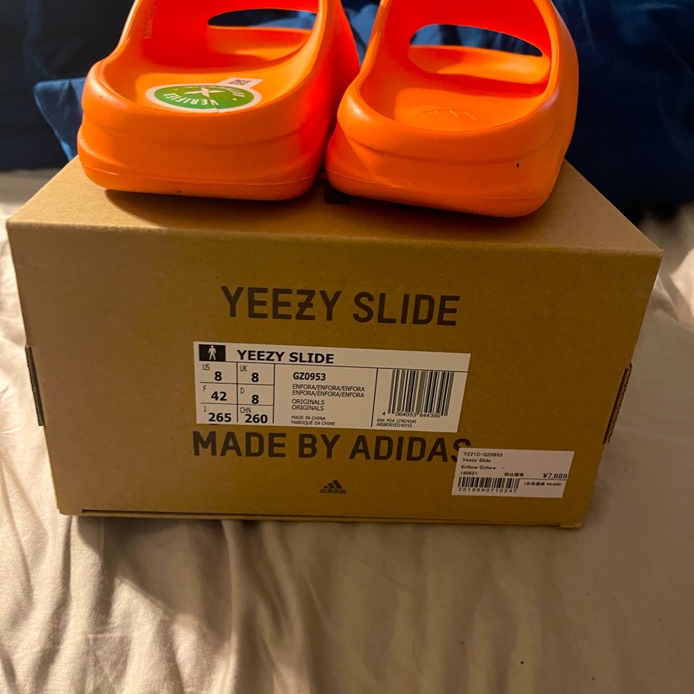 Brand new yeezy slides never worn.